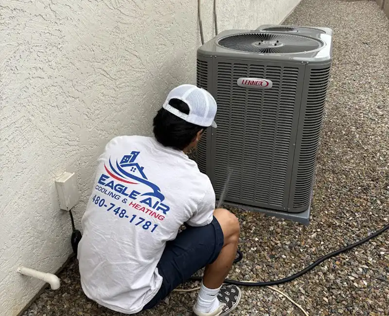 Eagle Air Tech working on AC unit