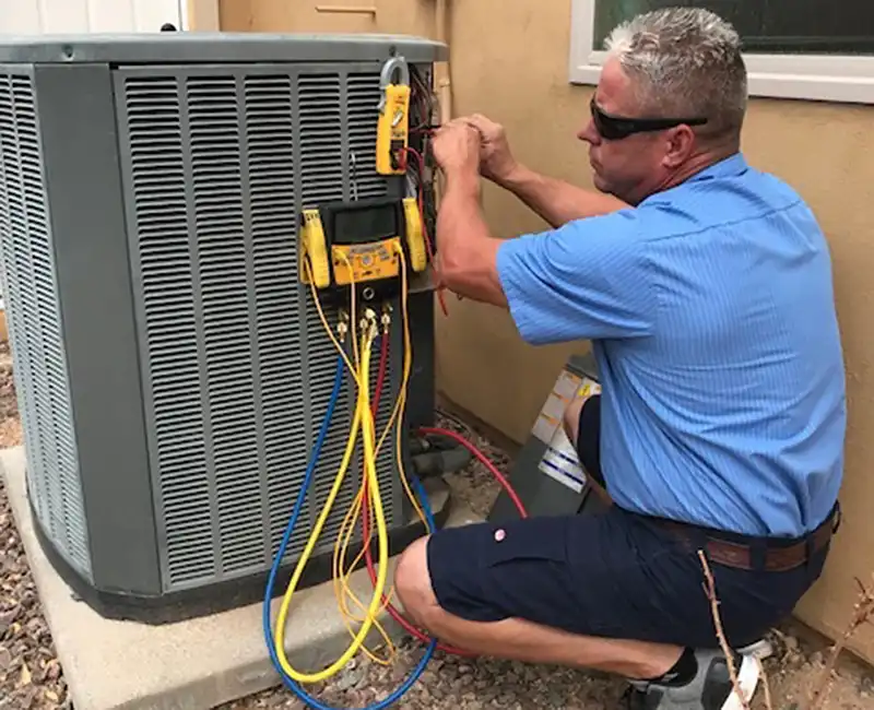 Eagle Air Technician Testing AC Unit
