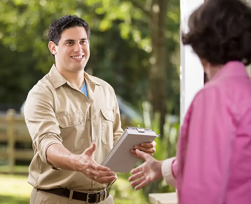 HVAC Technician meeting a customer