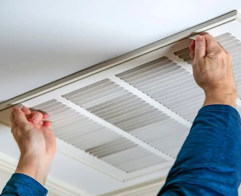 Man Opening Return Air FIlter Cover